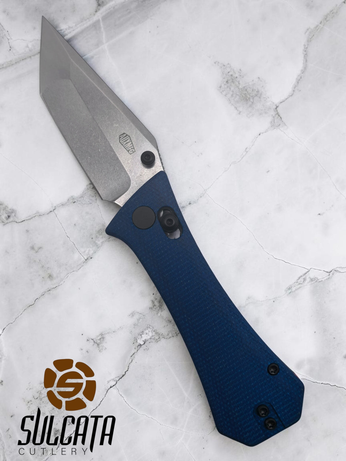 Auxiliary Manufacturing Coffin Tanto Manual Thumb Stud Folder Crossbar Lock Blue Micarta (2.7" SW)